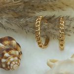 گوشواره زنانه ژوپینگ مدل کارتیه رنگ طلایی