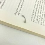پیرسینگ استیل ابرو مدل خمیده توپی - تصویر 3